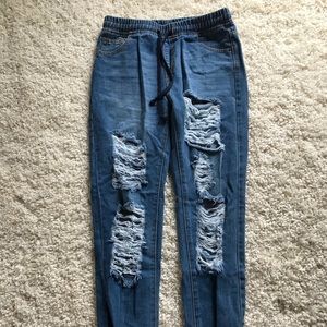 Distress denim jeans